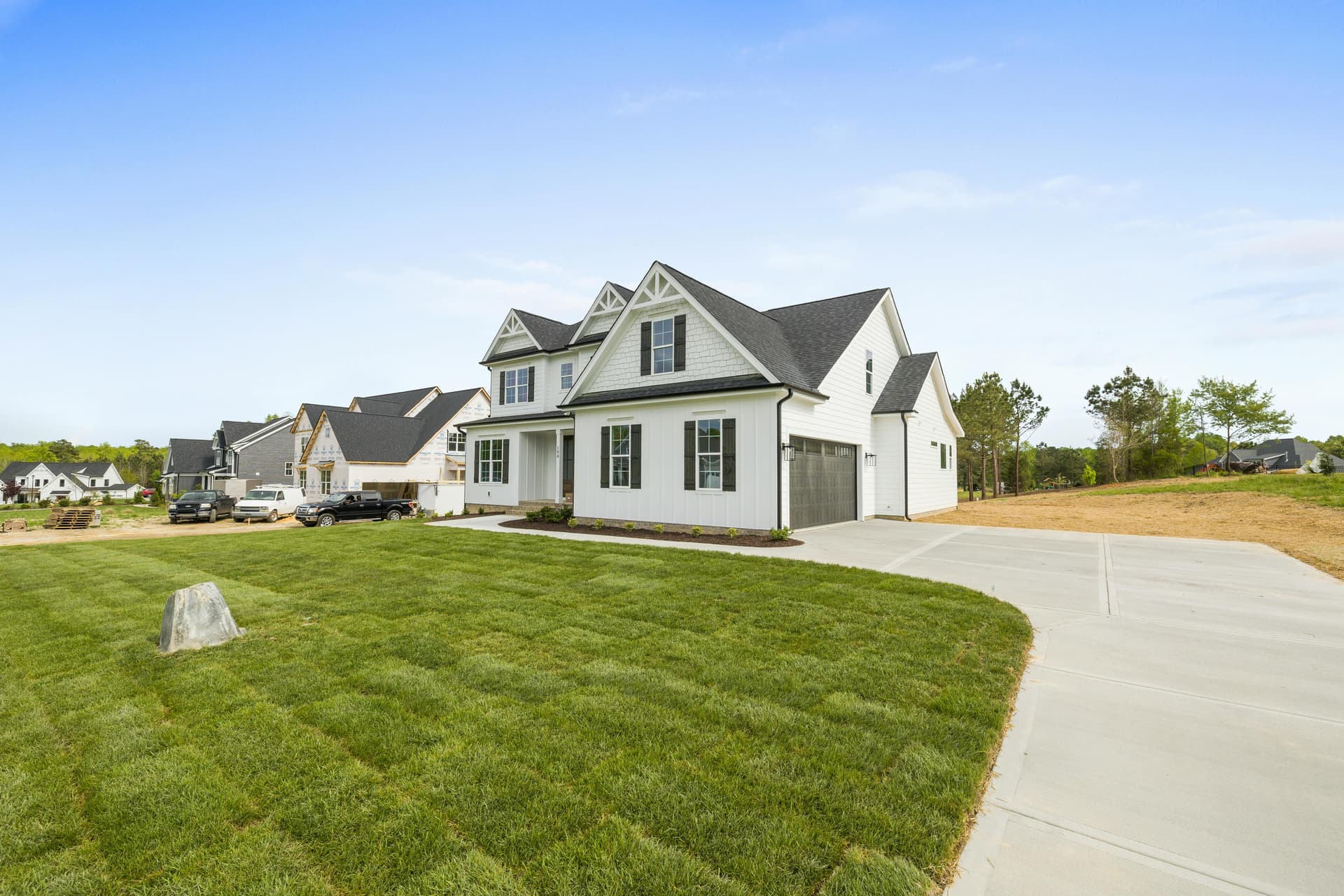 Beautiful home with a lush, green irrigated lawn
